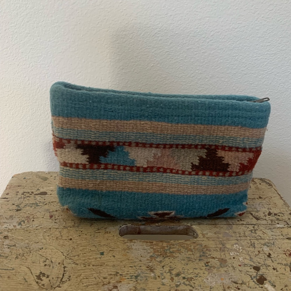 Manos Handmade wool clutch makeup bag